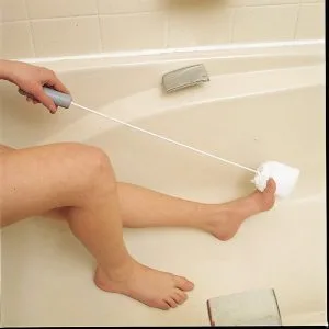 Brosse à orteils à long manche